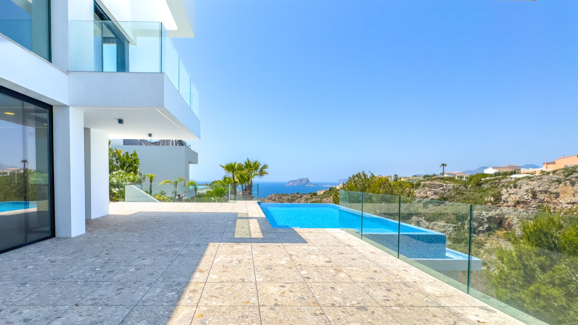 Pool terrace running the length of the house